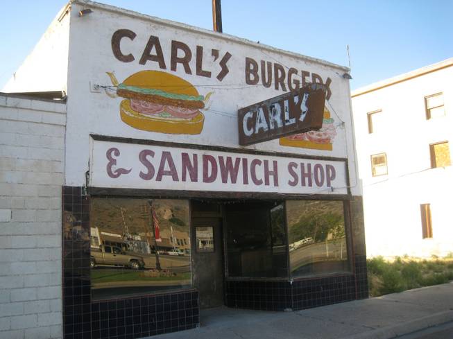 Carl's Burgers. I was going to eat here, but after sitting at a dusty counter for nearly an hour, it occurred to me -- this place is closed, too.