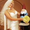 Holly Madison ties the knot with the Travelocity gnome at The Wedding Chapel at Planet Hollywood Resort & Casino on July 12, 2009, in Las Vegas. 