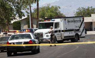 Police investigate a shooting Wednesday that left a woman dead in the northwest Las Vegas Valley. 