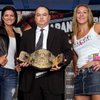 Strikeforce chief Scott Coker, center, holds the 145-pound women's title belt that was up for grabs 