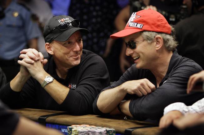 Kevin Schaffel laughs with Steven Begleiter after the two made the final table at the World Series of Poker at the Rio Hotel and Casino in Las Vegas on Wednesday, July 15, 2009.