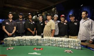 Players who made the final table of the World Series of Poker pose for a photograph at the Rio Hotel and Casino in Las Vegas on Wednesday, July 15, 2009. They are from left, James Akenhead, Jeff Shulman, Phil Ivey, Antoine Saout, Darvin Moon, Joseph Cada, Steven Begleiter, Kevin Schaffel and Eric Buchman.