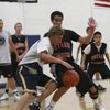 Boulder City High's Kyle Dimple (left) battles against Lake Mead Christian Academy's Landon Littlefield (right) during the Summer Madness tournament at Lake Mead Christian Academy. Boulder City lost 52-36.
