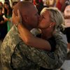 Master Sgt. Donald Sander, from the Nevada Army National Guard's Embedded Training Team, embraces hi