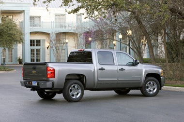 While other car companies have been dutifully putting gasoline-electric hybrid power into relatively modest-sized cars, General Motors had a different idea: Put the fuel-saving technology into some of the biggest passenger vehicles, including the company's best-seller, the Chevrolet Silverado pickup truck.