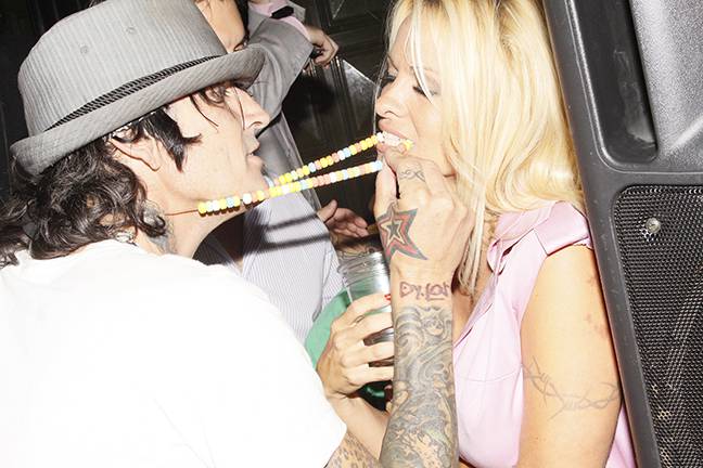 Tommy Lee and Pamela Anderson at Body English during the early morning hours of Aug. 2.
