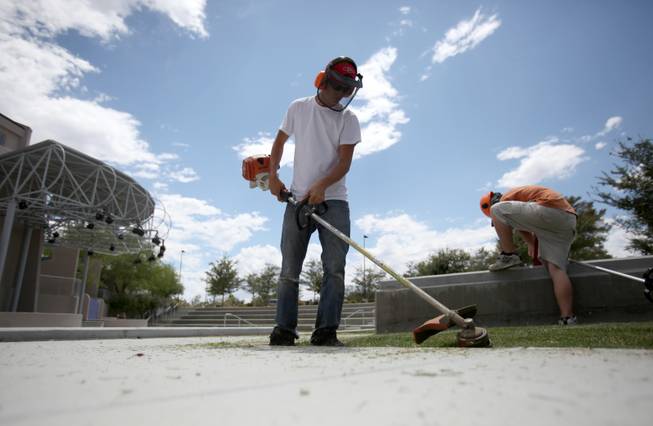 Mason Groves, a Boulder City High School senior, is one of almost 50 teenagers Boulder City has hired as part of the Workforce Investment Board's teen summer job program. Groves works on city landscaping crews.