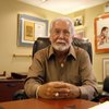 Joe Hand, a longtime boxing aficionado, poses in his office filled with boxing memorabilia in Feasterville, Penn. Hand is now involved with the Ultimate Fighting Championship.