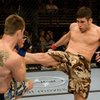 Amir Sadollah, right, lands a kick against C.B. Dollaway during "The Ultimate Fighter" season No. 7 finale in June 2008.