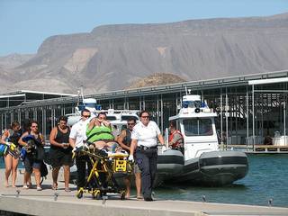 Rescued boaters return to shore at Hemenway Harbor at Lake Mead National Recreation Area. National Park Service rangers rescue six after their boat was swamped in 4-foot waves and 30 mph winds Thursday, Aug. 6, 2009. 