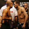 The Ultimate Fighting Championship weigh in at the Wachovia Center in South Philadelphia fon Friday afternoon August 7, 2009. The fight will take place on Saturday evening August 8, 2009. At left is UFC Lightweight Champion BJ Penn facing off with opponent Kenny Florian after weigh in on Friday afternoon at the Wachovia Center.
