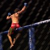 Newly crowned WEC bantamweight champ Brian Bowles celebrates his victory over Miguel Torres Sunday a