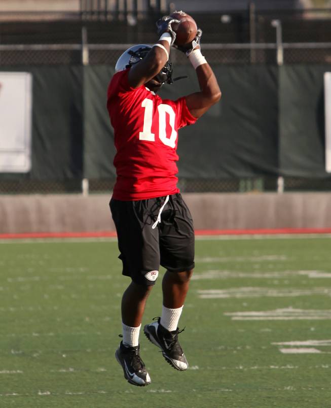 UNLV cornerback Quinton Pointer catches a ball earlier this week during practice at Rebel Park. Now fully healed from elbow and shoulder injuries, Pointer is vying for one of the open starting secondary spots on UNLV's defense.