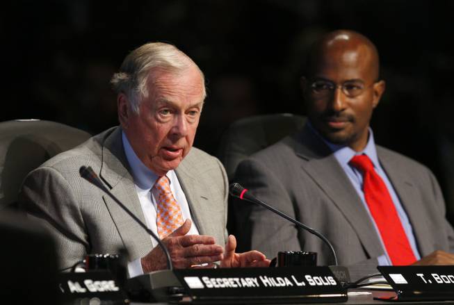 Energy executive T. Boone Pickens, left, speaks during a roundtable discussion at the National Clean Energy Summit 2.0 at UNLV Monday. At right is Van Jones, a special adviser for the White House Council on Environmental Quality. 
