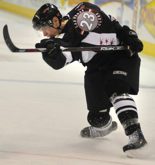 Adam Cracknell unleashes a booming slapshot during a game against the Idaho Steelheads on March 5, 2008 at the Orleans Arena. The former Wranglers power forward has signed an NHL contract with the St. Louis Blues.