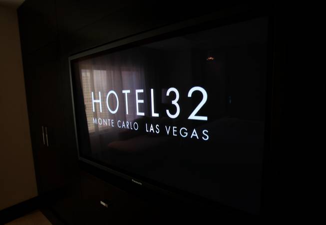 A TV shows HOTEL32's logo in one of the new ...