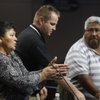 Paz Castillo, left, criticizes Republic Services' working conditions at a Las Vegas City Council mee