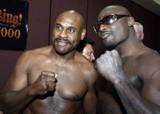 Heavyweight boxer Oliver McCall, left, and Franklin Lawrence during an official weigh-in at the Orleans hotel-casino Thursday, August 20, 2009. The boxers will face each other in a 10-round heavyweight bout at at the Orleans Friday.
