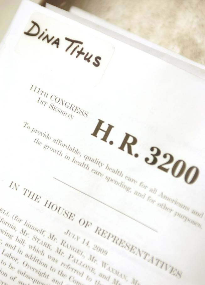 A draft version of House Resolution 3200, the health care reform legislation, rests on Rep. Dina Titus' desk.