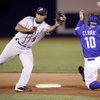 Abraham Nunez of the Reno Aces fails to get Howie Clark of the Las Vegas 51s out at second base during their game at Cashman Field in Las Vegas on Wednesday.