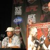 UFC President Dana White talks during Thursday's UFC 102 press conference as Randy Couture looks on at the Portland Marriott Downtown Waterfront.