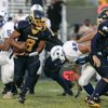 Boulder City High School's Devin Combs looks for some running room during the first half of a game against Basic High School on Friday in Boulder City. Basic won the game 26-0 to retain the rivalry's milk jug.