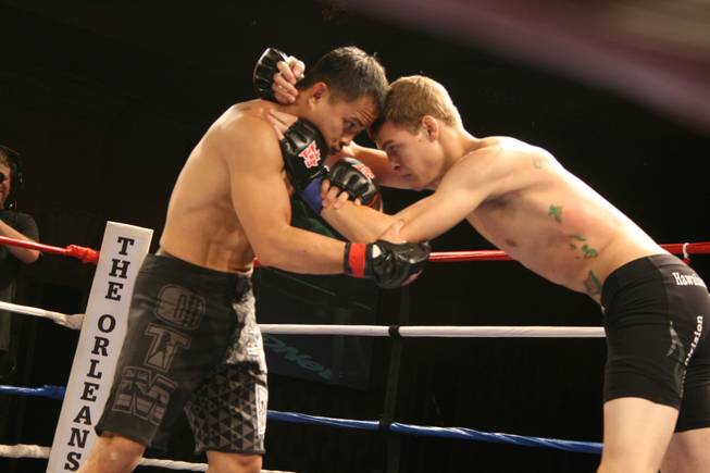 Shane Larsen clinches up with Robbie Lagasca at Tuff-N-Uff: USA vs. Canada. Larsen went on to win by unanimous decision. 