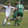 Boulder City soccer player Trevor Montgomery, left, controls the ball against Virgin Valley defenders Joel Medina (8) and Tanner Tichenor (21) last week during a match at Boulder City. The Eagles scored the final goal to tie the Bulldogs 2-2.