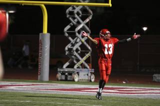 Arbor View full back Thomas Flanagan celebrates after scoring a touchdown in the second half of Thursday's game against Centennial. The Aggies were victorious over the Bulldogs 38-13.