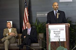Brian Greenspun, left, and UNLV President Neal Smatresk listen as new director William Antholis speaks at the announcement of the Brookings Institution's new Mountain West Initiative at UNLV's Greenspun Hall on Tuesday, Sept. 8, 2009.  