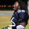 Canyon Springs offensive lineman Adrian Noel gets fired up after a big play by his Pioneer teammates against Green Valley on Friday night.