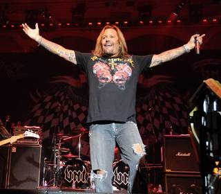 Motley Crue's Vince Neil performed Saturday, Sept. 12, 2009, at the Rio to kick start some skin art at the grand opening of his newest tattoo shop, Vince Neil Ink. The entrepreneurial-minded Motley Crue frontman christened his first bar and grill in the city, Feelgood's, in August.