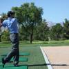 Marc Turnesa practices Tuesday on the driving range at TPC at Summerlin in Las Vegas during media day for the Justin Timberlake Shriners Hospitals for Children Open. Turnesa is the tournament's defending champion.