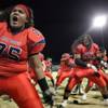 Liberty celebrates a 34-14 home win against Green Valley.