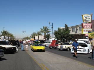 People gather for the 10th annual Super Run Car Show at 200 South Water St. in Henderson to view and display classic vehicles.