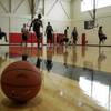 The Findlay College Prep hoops team practices Tuesday at the Henderson International School, with which the defending national-champion Pilots are affiliated.