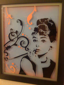 Audrey Hepburn, classy <em>and</em> glassy.