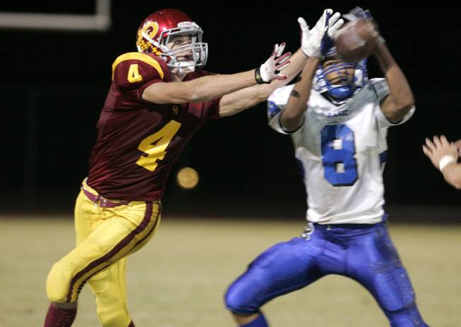 Del Sol's Evan Weinstock fights for a reception in a ...