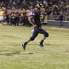 Boulder City High quarterback Ryan Washburn runs it in for the winning touchdown against Faith Lutheran Friday night at Boulder City. The Eagles were victorious over the Crusaders 15-10..