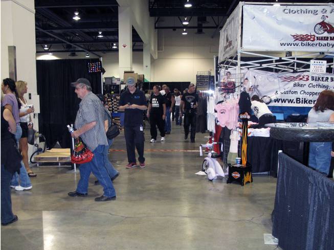 Some of the 30,000 people expected to attend the Las Vegas BikeFest this weekend walk through the vendor booths at the Cashman Center on Friday.