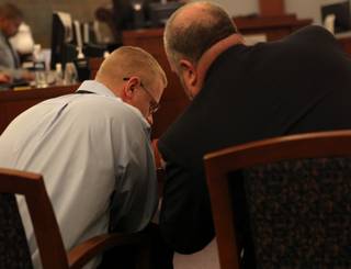 John Morgan talks with his attorney, Marty Hart, during jury selection Tuesday.  Morgan and another man, Roger Jenkins, are accused of setting a pipe bomb off inside the Burlington Coat Factory store in Henderson earlier this year.