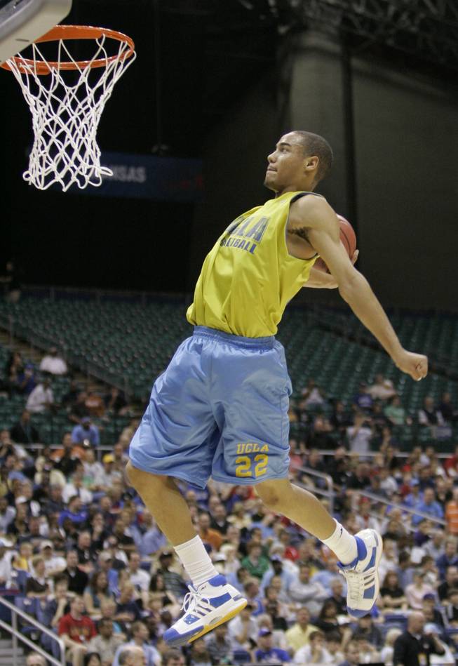 Chace Stanback, then a freshman at UCLA, dunks during an open practice session at the 2008 Final Four in San Antonio. After playing sparingly in 25 games for the Bruins, he transferred to UNLV, where he figures to be a key figure for the Rebels this season.