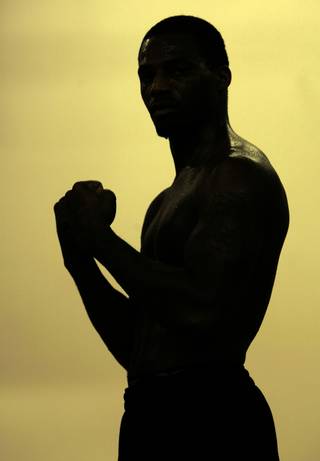 Light heavyweight boxer Chad Dawson is silhouetted after a workout at the International MMA Fight Club Wednesday, Oct. 7, 2009. Dawson is preparing for a Nov. 7 rematch against Glen Johnson at the Excel Arena in Hartford, Conn. 