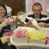 Air Force Airman 1st Class Holly Hughes, who is 22 weeks pregnant, and Airman 1st Class Michael Ruar