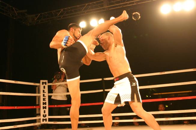 Odis Ruiz delivers a high kick to Mike Dizak at MMA Xplosion at the M Resort.
