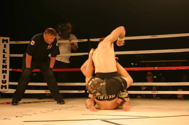 Chris Engle battles it out with Dustin Chaviler at MMA Xplosion at M Resort.