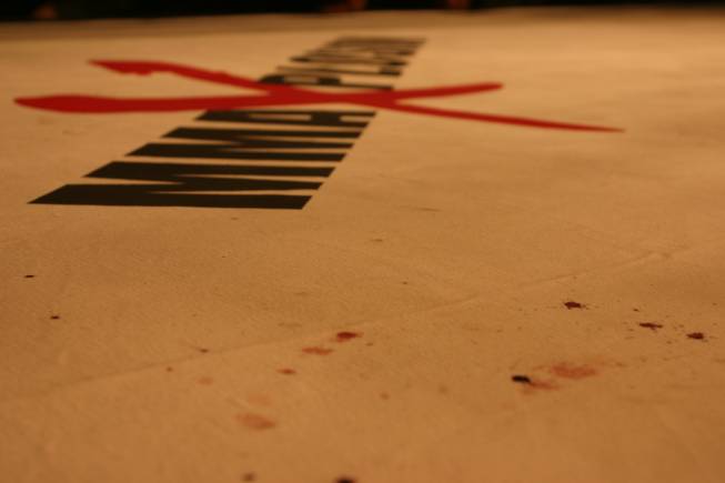 The first drops of blood on the mat from Mike Dizak in his bout against Odis Ruiz at MMA Xplosion at M Resort.