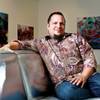 Todd VonBastiaans, sitting in his gallery/lighting business, is exhibiting this month the work of La