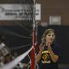 Senior Paxton Fleming cheers for her teammates after they scored Monday during volleyball practice at Boulder City High School.