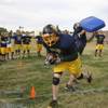 Senior wide receiver Danny O'Conner breaks through a block during offensive drills Monday during practice at Boulder City High.